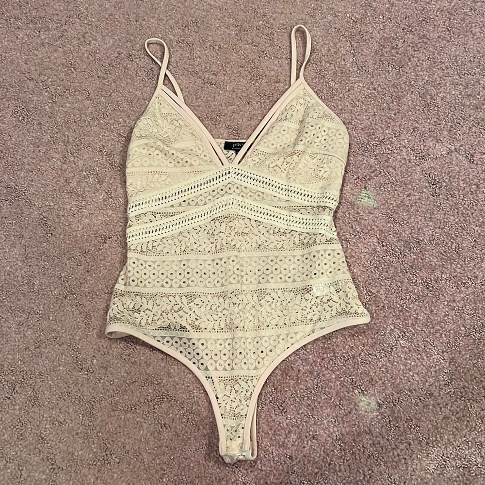 Tan body suit